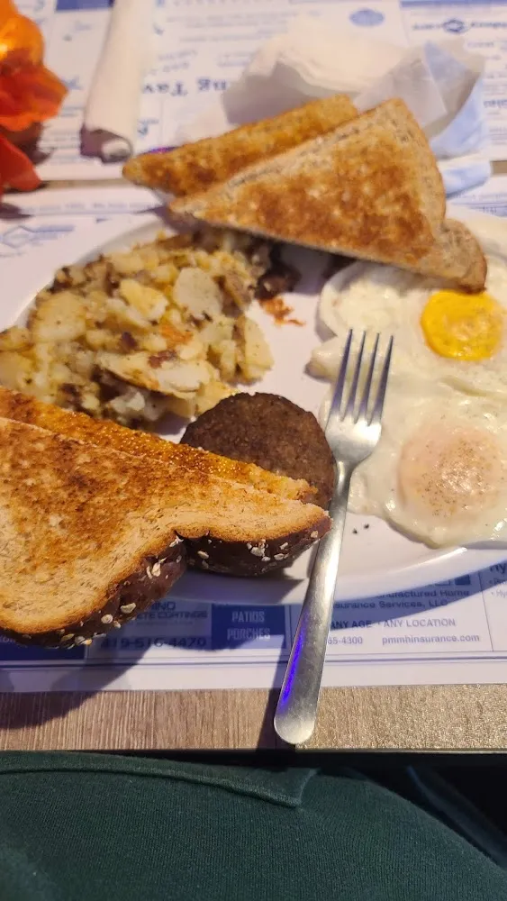 2 Eggs Homefries Sausage and Wheat Toast